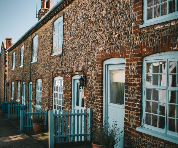 Row of cottages with blue doors