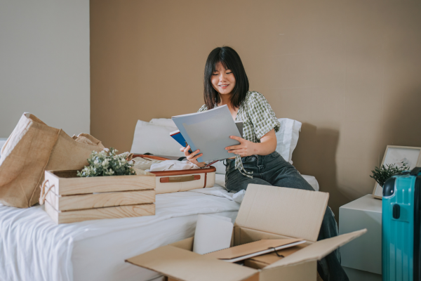 Woman sorting through files